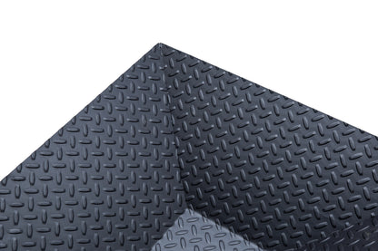 Diamond Plate Fire Pit in black steel with inverted square pyramid bowl and heavy-duty tread pattern legs.