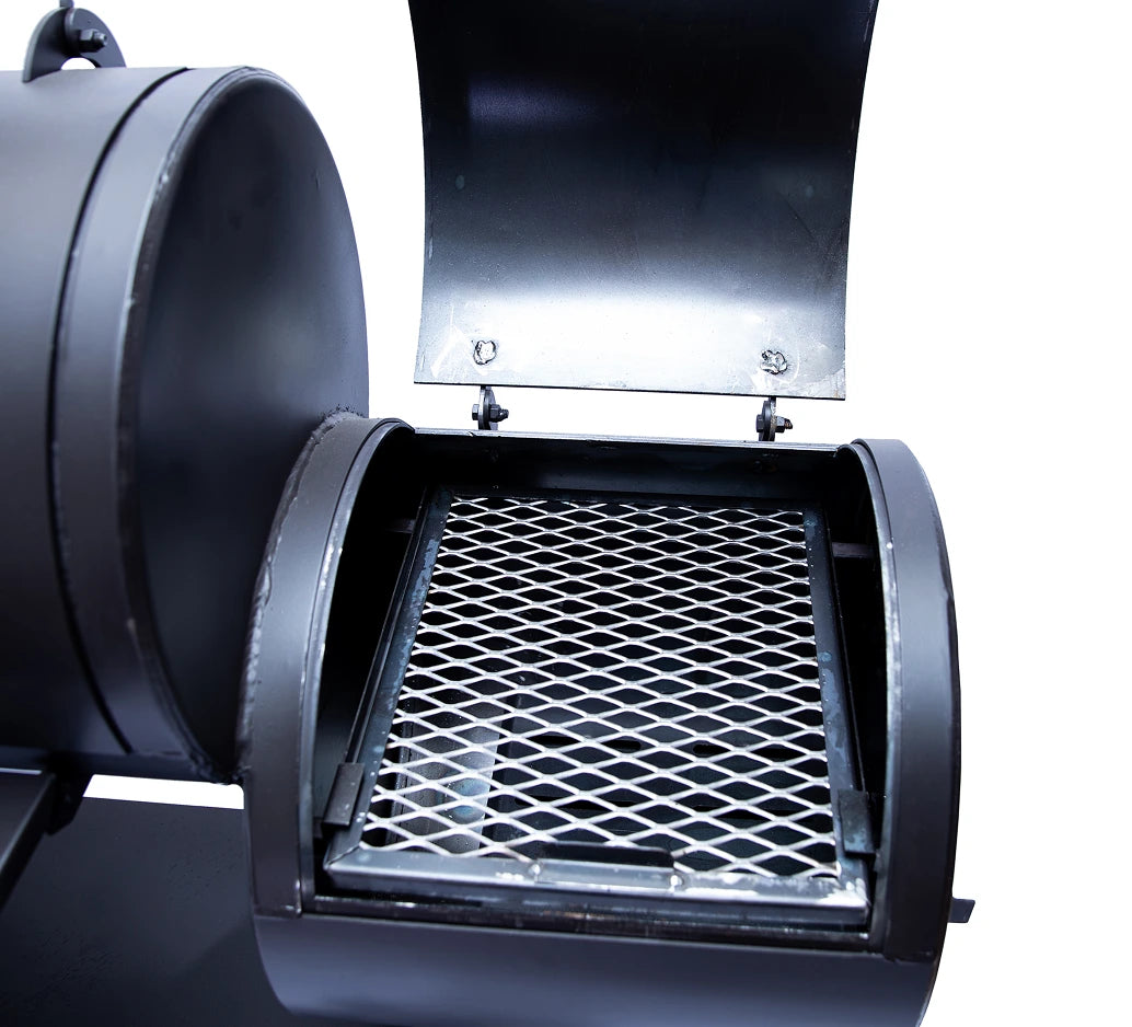 Old Country BBQ Pits Wrangler offset BBQ Smoker, firebox lid open, cooking grate view.
