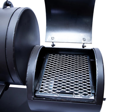 Old Country BBQ Pits Wrangler offset BBQ Smoker, firebox lid open, cooking grate view.